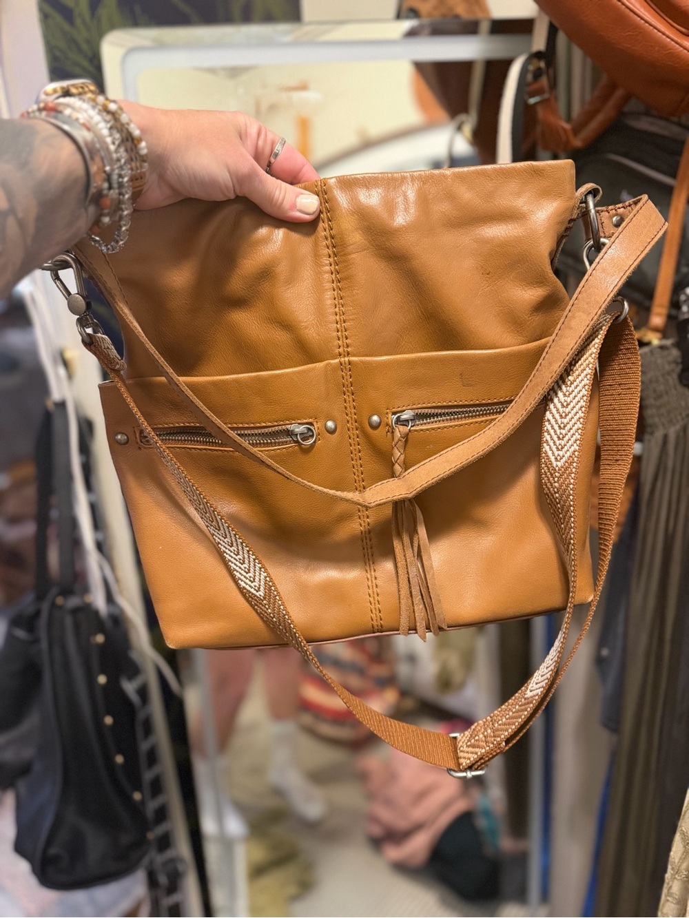 The Sak Tan Leather Crossbody with Woven Strap & Tassel